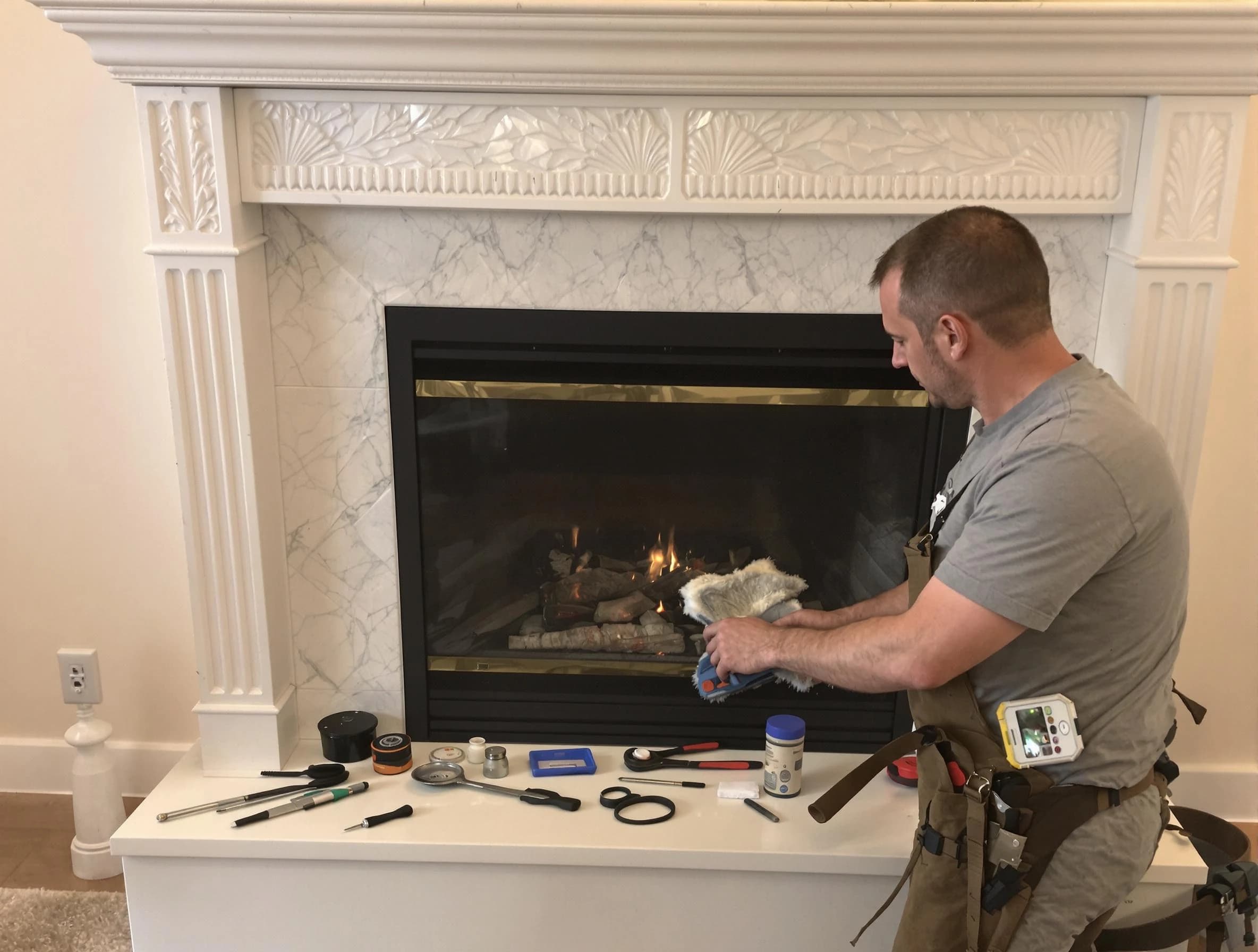 Peabody Chimney Sweep performing fireplace maintenance in Peabody, MA
